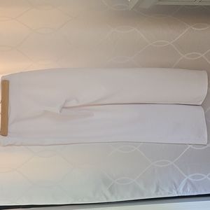 White palazzo pants. Made in Jamaica. Excellent Condition. Elastic Waist.